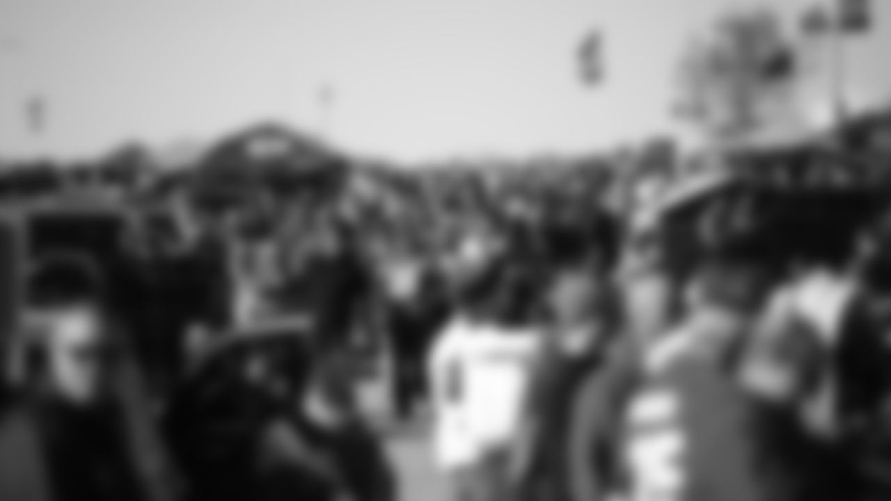 Fans arrive at the stadium prior to an NFL football game against the Dallas Cowboys, Sunday, November 21, 2021 in Kansas City.