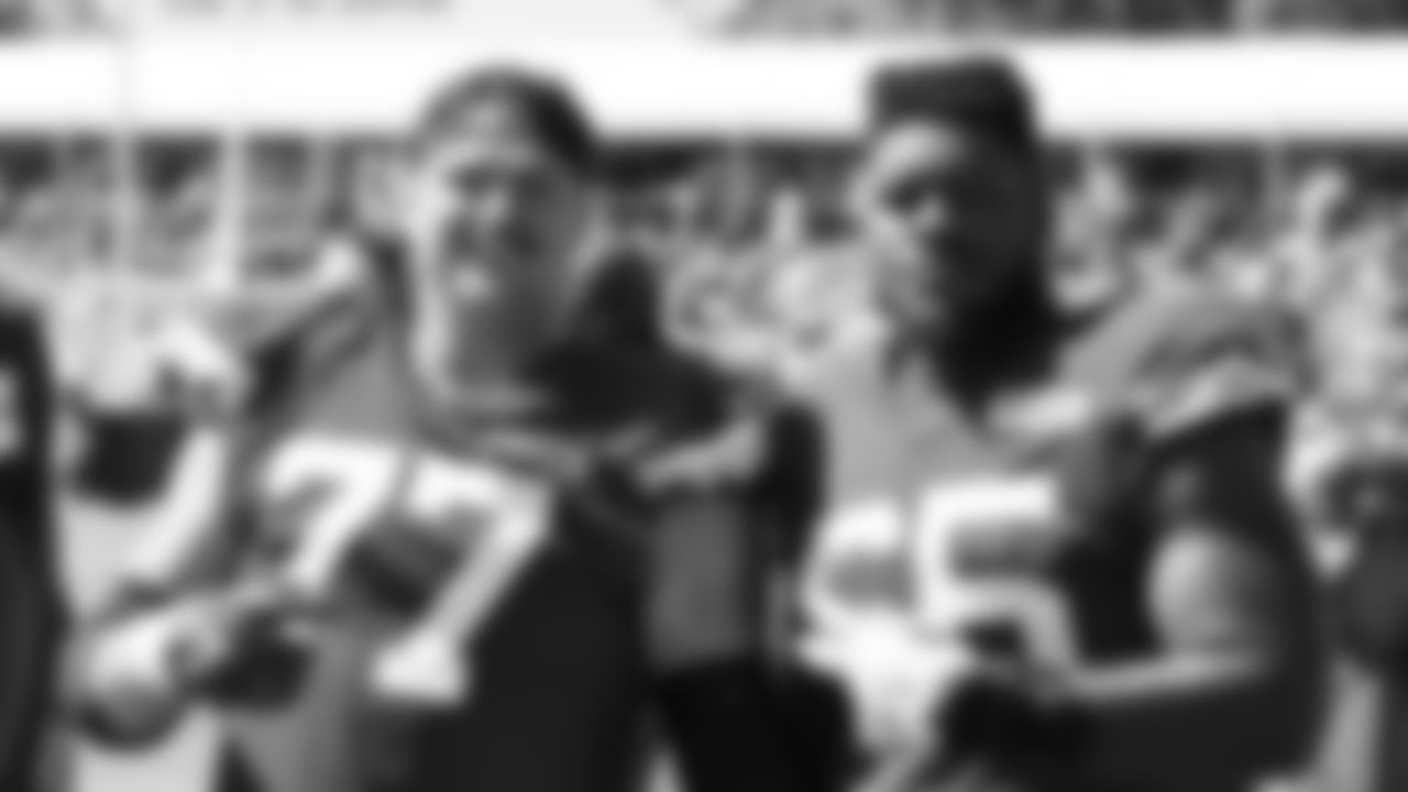 Kansas City Chiefs offensive guard Andrew Wylie (77) and offensive guard Trey Smith (65) on the sideline during training camp at Missouri Western State University, Tuesday August 9, 2022.