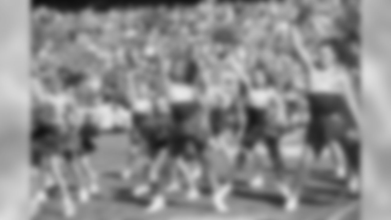 Kansas City Chiefs Cheerleaders and Junior Chiefs Cheerleaders Perform at Halftime during the Chiefs vs Rams game