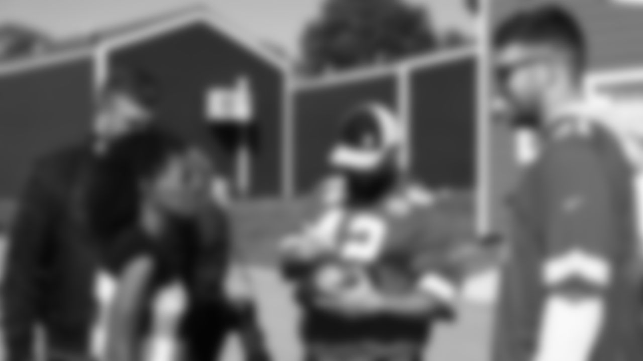 Chiefs players visit the Veterans Community Project to help put finishing touches on homes within the community, followed by a cookout with the residents of VCP. T