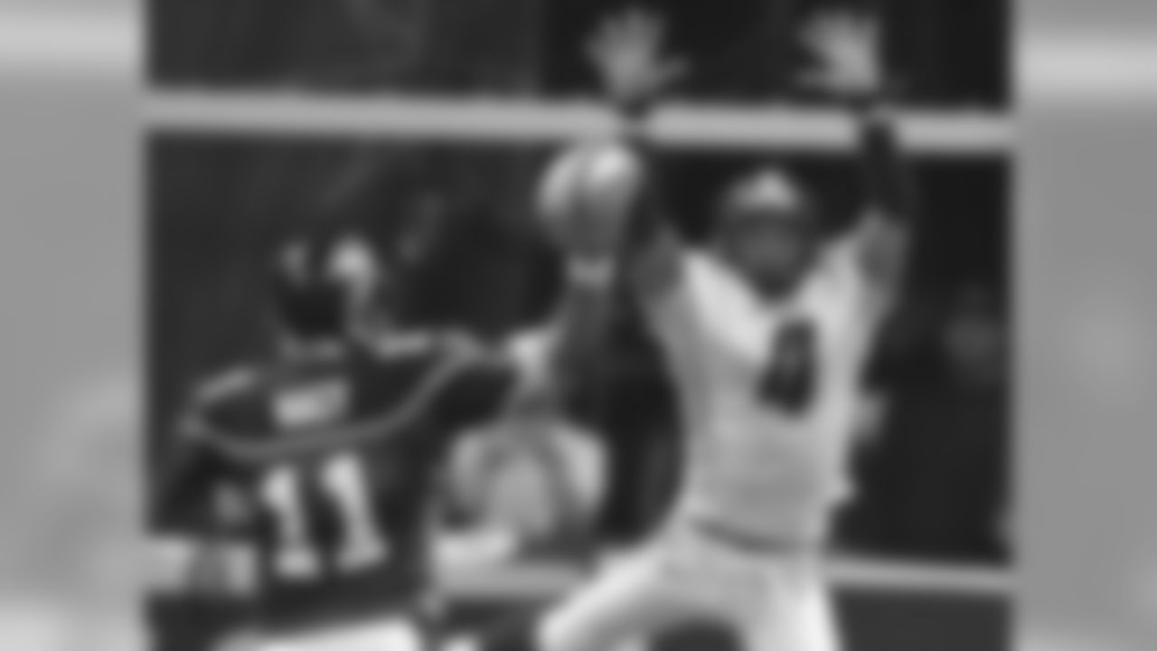 Colorado Crush'S Rashad Floyd leaps in attempt to block a pass thrown by Georgia Force quarterback Matt Nagy during the second quarter of Arena Bowl XIX in Las Vegas on Sunday, June 12, 2005. Colorado beat Georgia, 51-48.