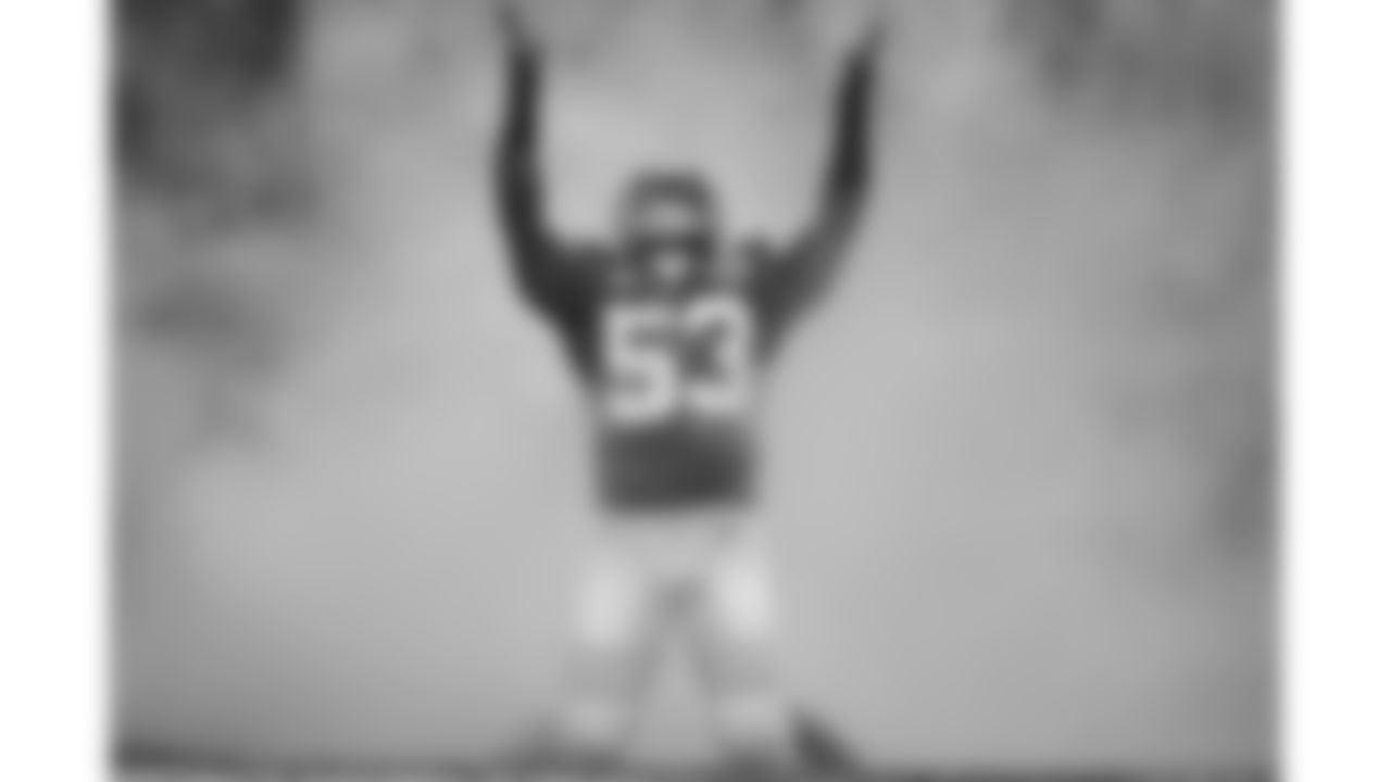 Kansas City Chiefs middle linebacker Anthony Hitchens (53) emerges from the fog in the tunnel during player introductions prior to an NFL Divisional Round Playoff game, Sunday, Jan. 17, 2021 in Kansas City.