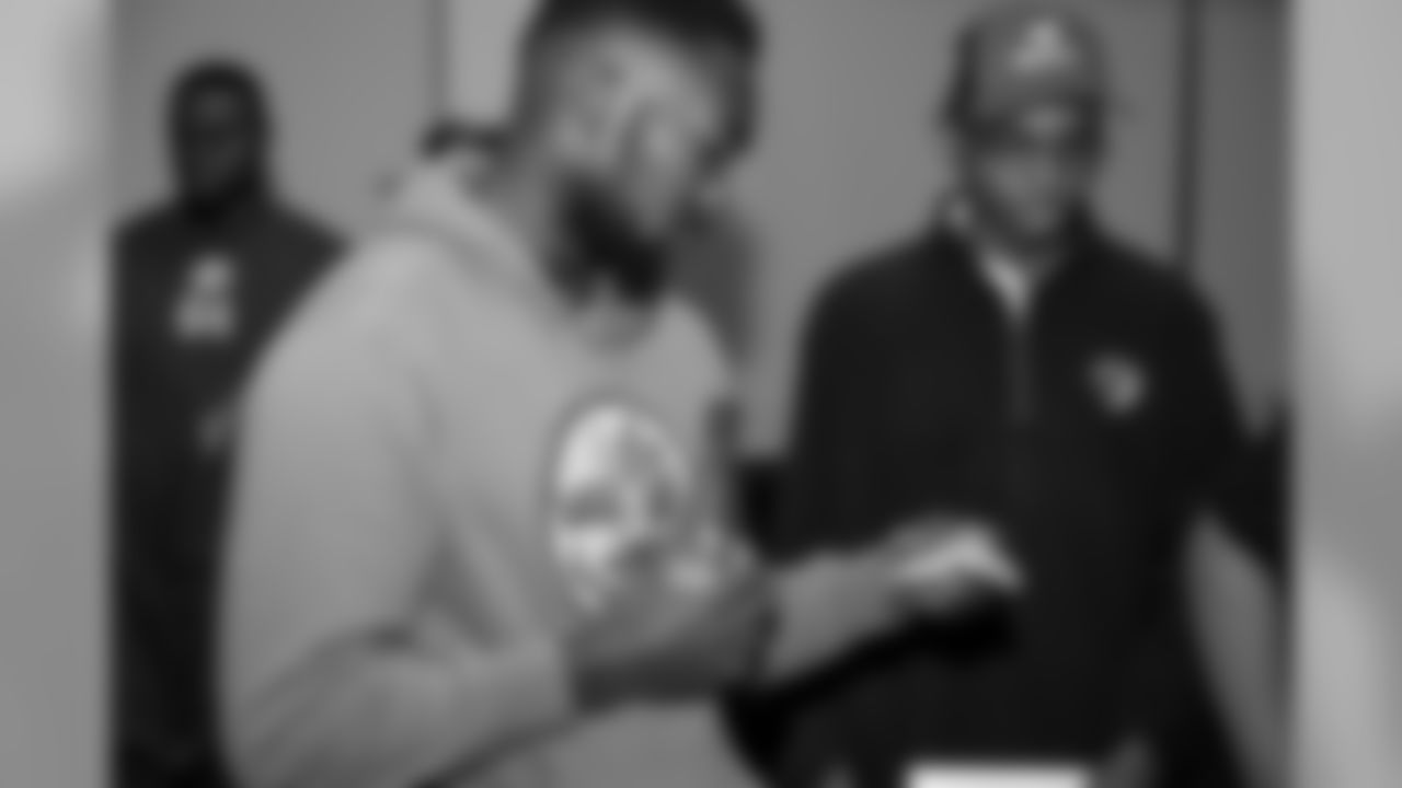 Laurent Duvernay-Tardif, along with the help of his teammates, explains the basics of healthy living and nutrition to a group of 20 young men from BoysGrow on Monday afternoon. The player-led initiative marked the second installment of the players' "4th Quarter Program" which seeks to address social justice areas of particular importance to the players themselves.