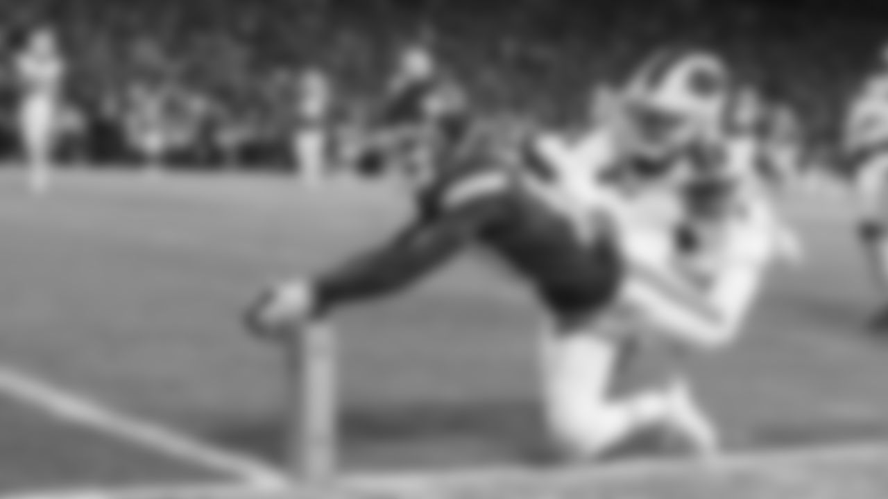 Kansas City Chiefs wide receiver Mecole Hardman (17) dives into the end zone during the divisional playoff football game against the Buffalo Bills, Sunday, January 23, 2022 in Kansas City.