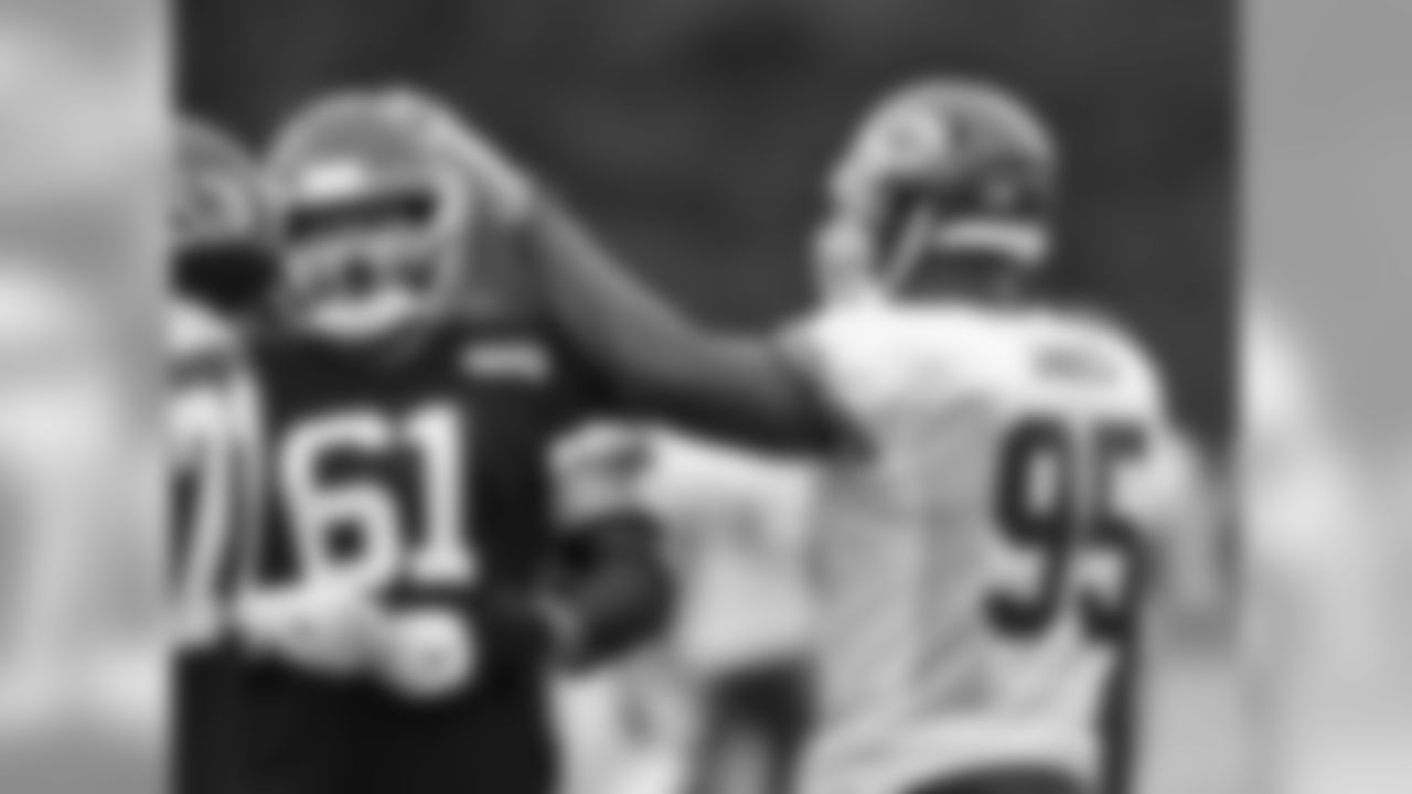 Kansas City Chiefs offensive lineman Mitch Morse (61) and Kansas City Chiefs defensive tackle Chris Jones (95) during practice on 8/6/18 at Chiefs Training Camp at Missouri Western State University in St. Joseph, Missouri.