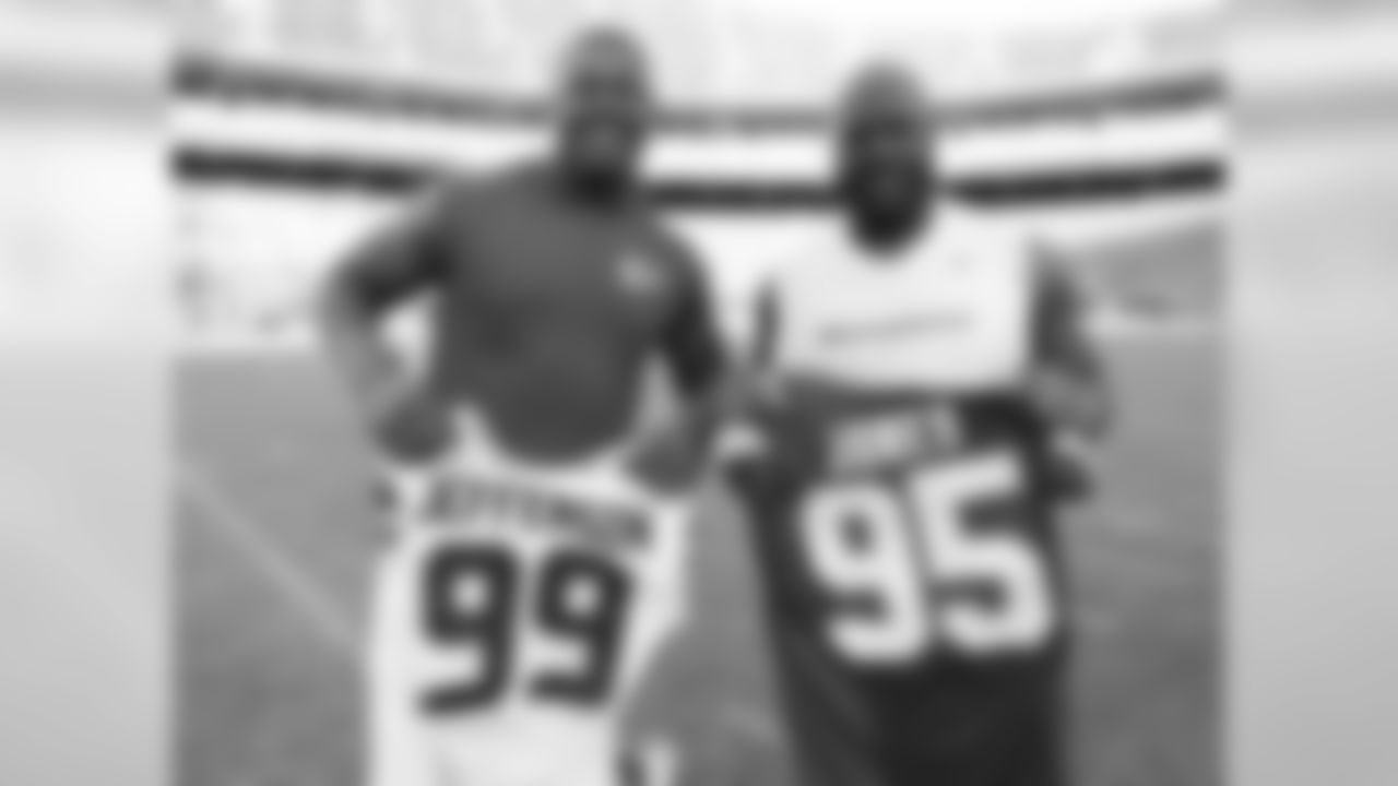 Kansas City Chiefs defensive lineman Chris Jones (95) and Seattle Seahawks defensive tackle Quinton Jefferson (99) exchange jerseys after the preseason game at Arrowhead Stadium on Saturday, August 13, 2016.