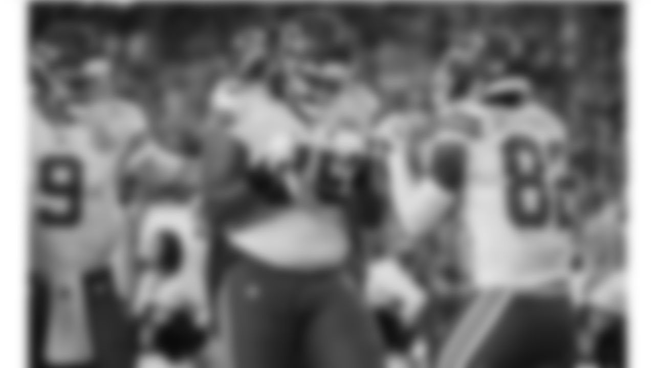 Kansas City Chiefs tackle Darian Kinnard (75) celebrates a touchdown during the game at the Chiefs preseason Week 2 matchup against the Arizona Cardinals on Saturday, August 19, 2023.