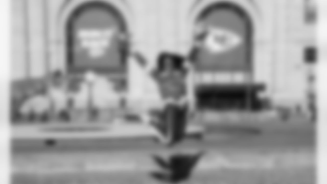 A Kansas City Chiefs Cheerleader performs in front of Union Station in Kansas City, MO