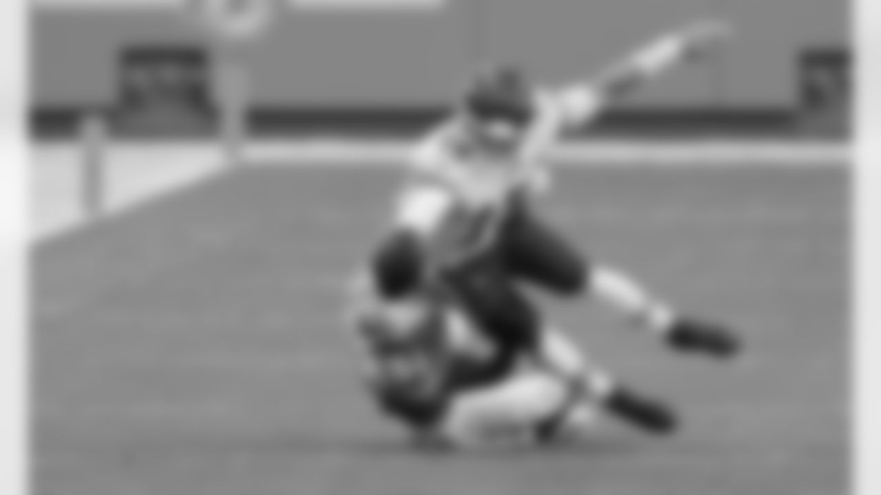 Kansas City Chiefs Quarterback Patrick Mahomes (15) reaching for a first down during an NFL Football game against the Miami Dolphins, Sunday December 13, 2020 in Miami Gardens.