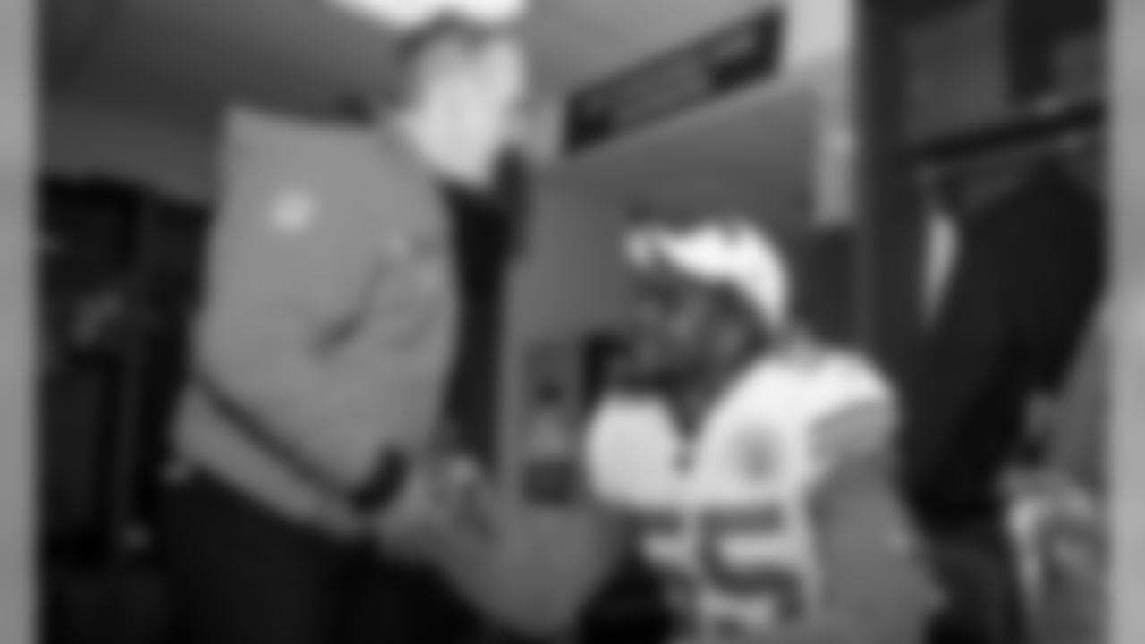 Kansas City Chiefs Defensive End Frank Clark (55) and Defensive Coordinator Steve Spagnuolo after the game between the Kansas City Chiefs and the New England Patriots on December 8, 2019.