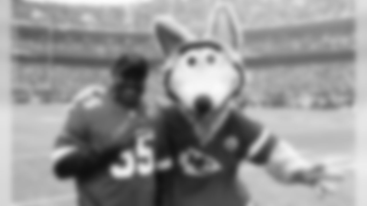 Coca Cola Coin Toss Captain and KC Wolf prior to the game between The Kansas City Chiefs and The Houston Texans in the Divisional Playoff game at Arrowhead Stadium on January 12, 2019.
