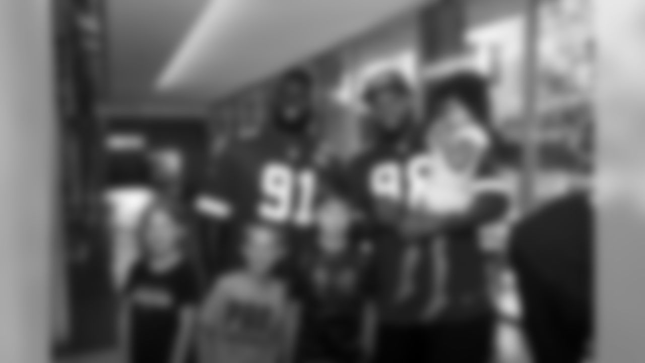 The defensive line visits the Ronald McDonald House
