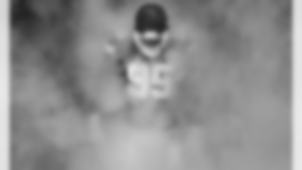 Kansas City Chiefs defensive tackle Chris Jones (95) emerges from the fog in the tunnel during player introductions prior to an NFL Divisional Round Playoff game, Sunday, Jan. 17, 2021 in Kansas City.