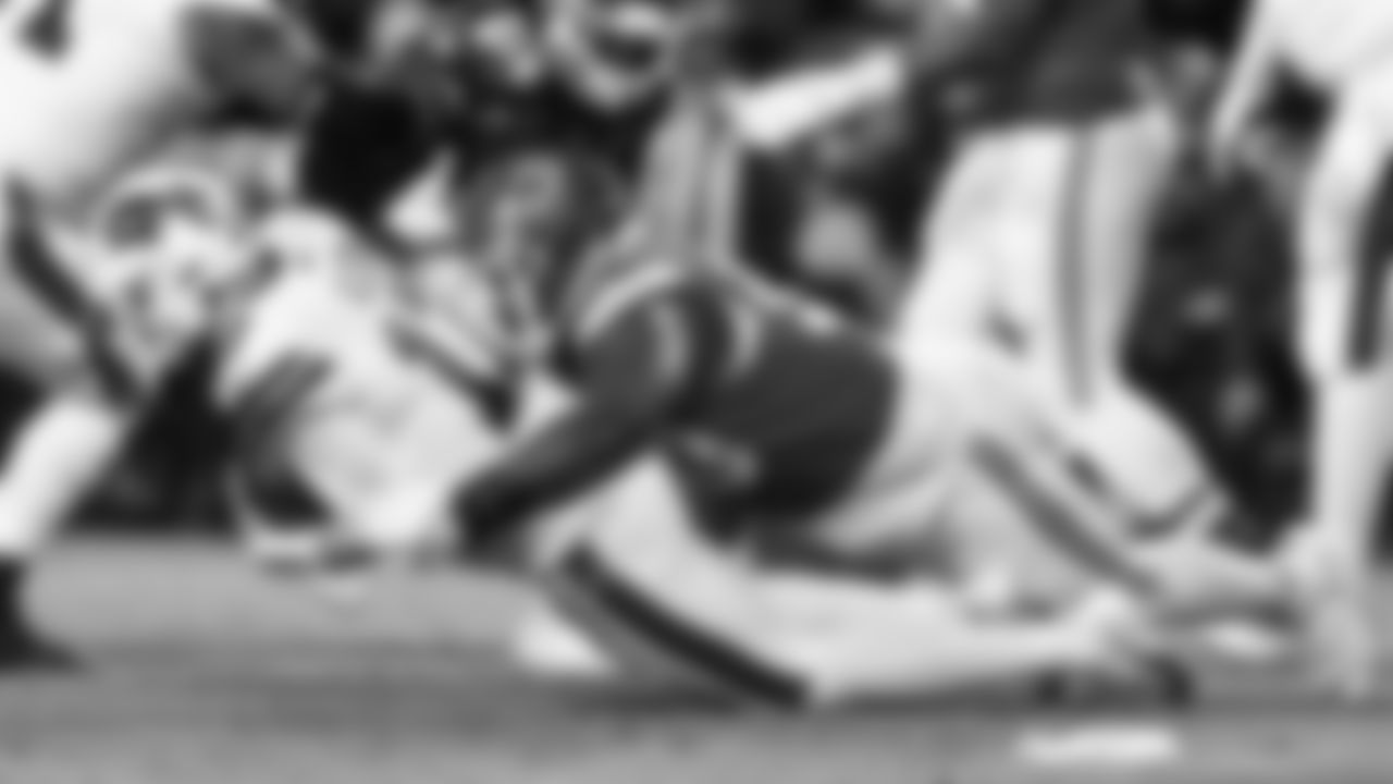 Kansas City Chiefs defensive tackle Jarran Reed (90) sacks the quarterback during the divisional playoff football game against the Buffalo Bills, Sunday, January 23, 2022 in Kansas City.