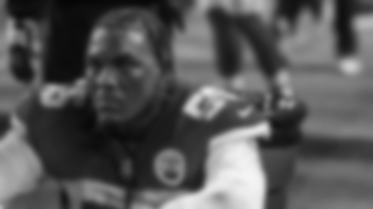 Kansas City Chiefs defensive end Frank Clark (55) rests on the bench during the divisional playoff football game against the Buffalo Bills, Sunday, January 23, 2022 in Kansas City.