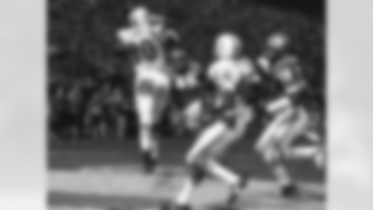 The 1971 AFC Divisional Playoff Game between the Kansas City Chiefs and the Miami Dolphins, played on Christmas day, was a seesaw battle of touchdowns and field goals that didn't end until halfway through a second overtime period. The marathon game lasted eighty-two minutes and forty seconds and by all accounts was one of the most exciting games ever played. The Chiefs went on to lose 24-27 in the second overtime.