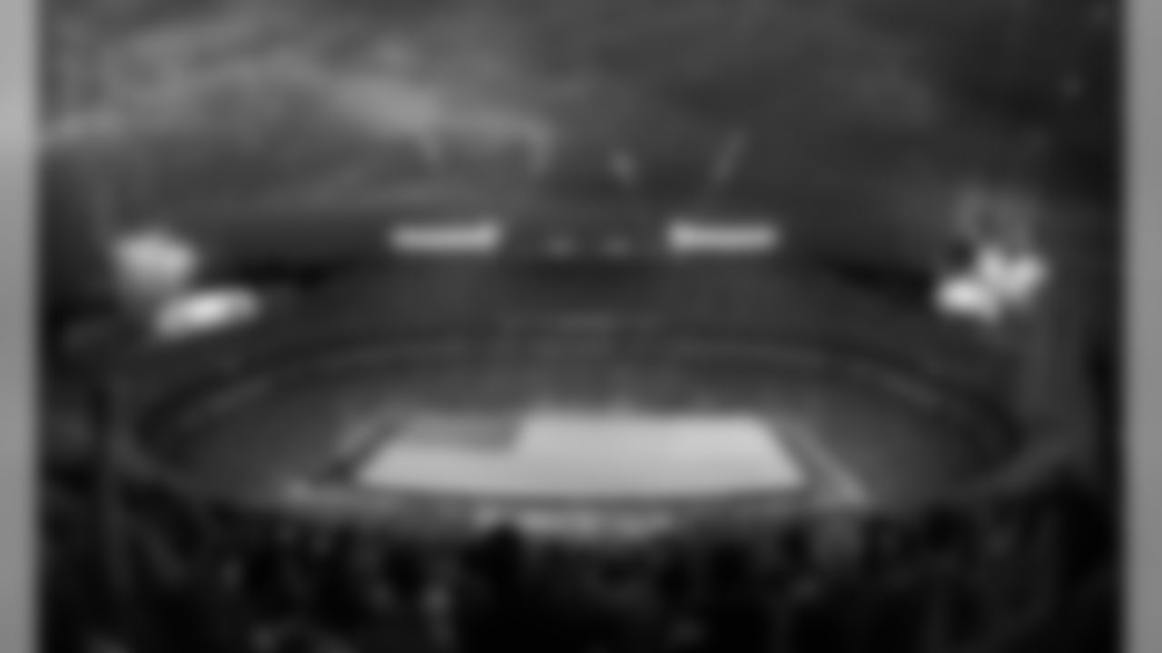 Fireworks burst from the corners of Arrowhead Stadium as a gigantic American flag is unfurled across the field during the National Anthem.
The Kansas City Chiefs lost to the Denver Broncos 24-31 on Thursday, September 17, 2015.