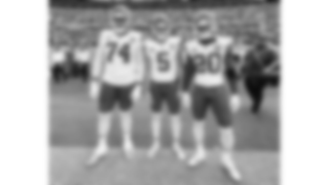 Kansas City Chiefs offensive tackle Jawaan Taylor (74), punter Tommy Townsend (5), and safety Justin Reid (20) prior to the NFL week 2 matchup against the Jacksonville Jaguars at EverBank Stadium in Jacksonville, Florida on September 17, 2023.