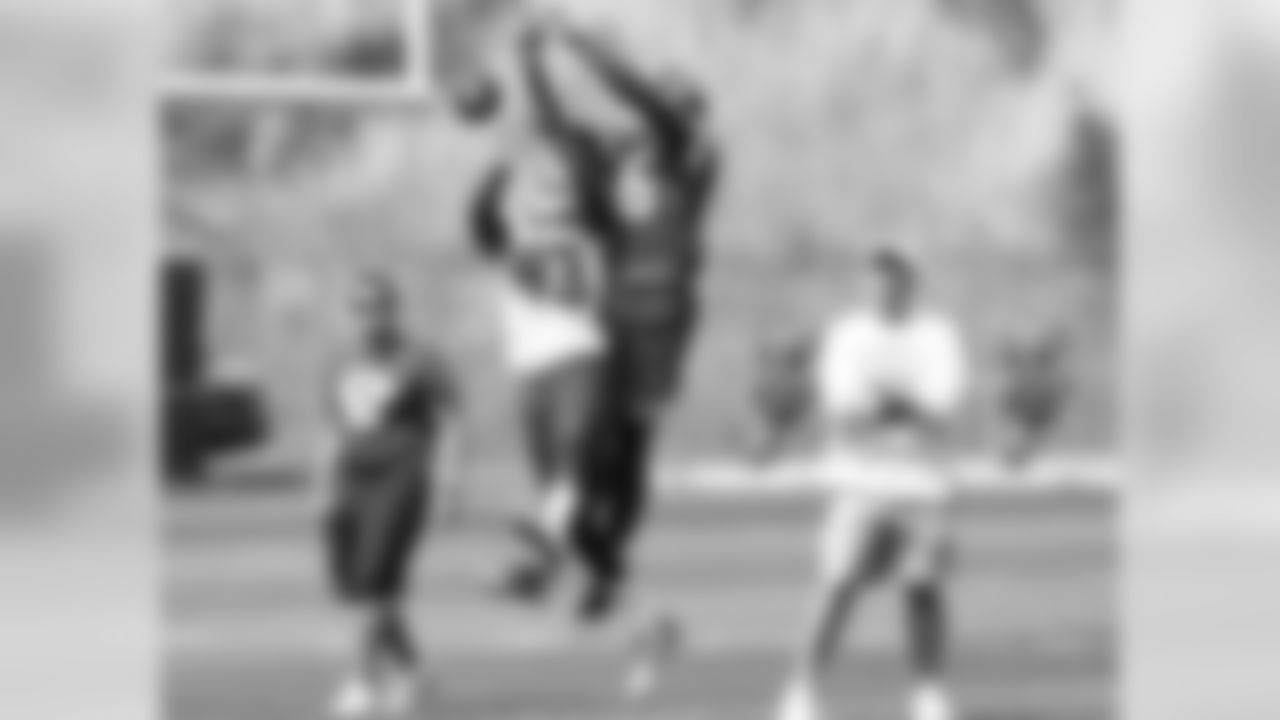 (43) DB De'Vante Bausby making a play on the ball in front of (6) WR Kenny Cook