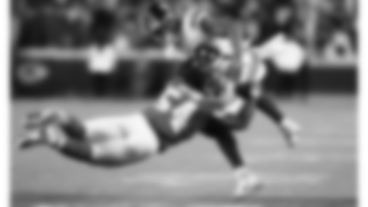 Kansas City Chiefs linebacker Nick Bolton (54) makes a diving tackle during an NFL football game against the New York Giants, Monday, November 1, 2021 in Kansas City.