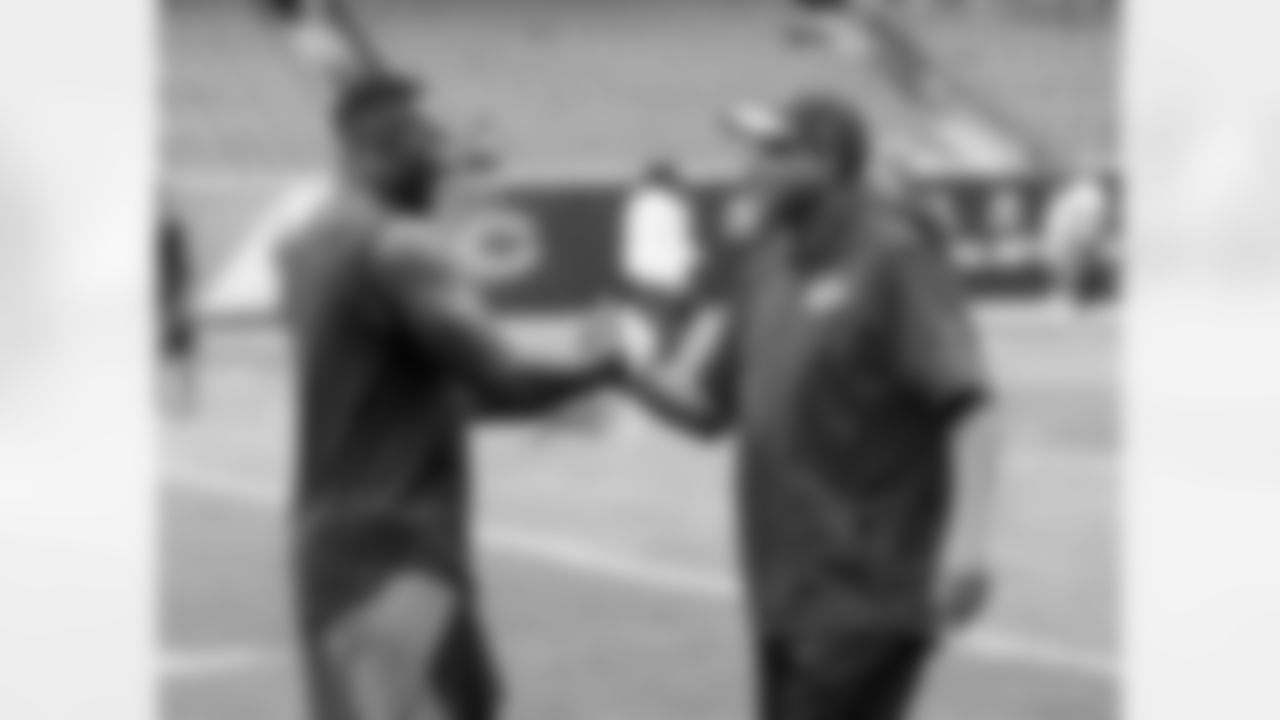 Kansas City Chiefs wide receivers coach David Culley shakes hands with a Chicago Bears player prior to the preseason game, Saturday, August 27, 2016, in Chicago, Illinois.