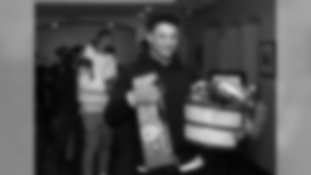 Pat Mahomes and Travis Kelce make a surprise visit to a family in need. While there, representatives from KC Southern and the Guadalupe Centers will inform the family that they will help pay for their home utilities for a year's duration via the Guadalupe Centers' Family Support Services programming. During the visit, Pat and Travis also brought along food and gifts for the family.
