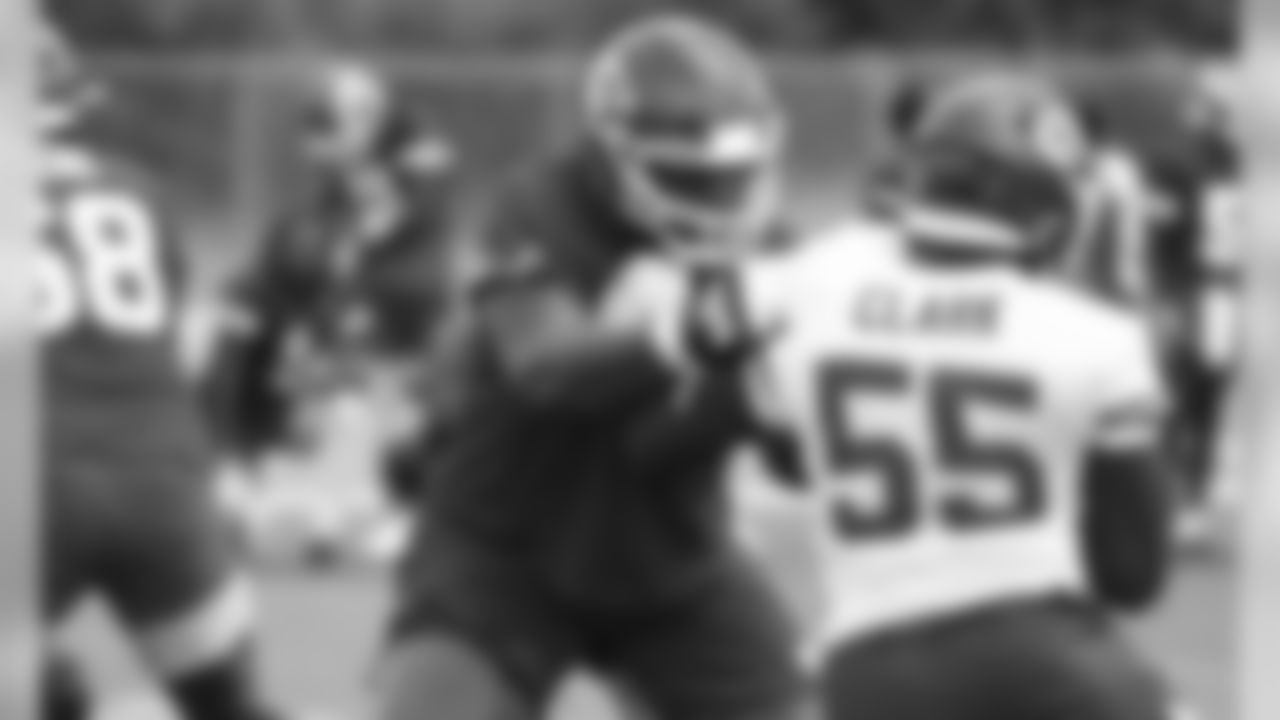 Kansas City Chiefs Defensive End Frank Clark (55) Kansas City Chiefs Offensive Lineman Dino Boyd (64) during a 2019 practice at The University of Kansas Health System Training Complex in Kansas City, MO.