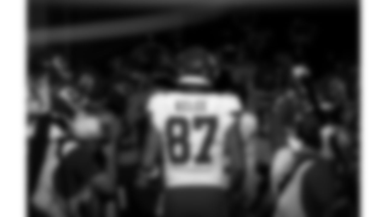 Kansas City Chiefs tight end Travis Kelce (87) in the team huddle prior to an NFL football game against the Tennessee Titans, Sunday, October 24, 2021 in Nashville.