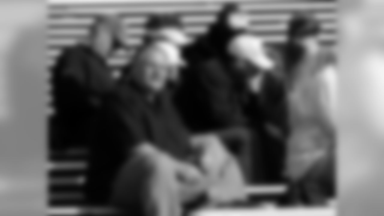 Andy Reid observes practice along with the Chiefs' Personnel staff