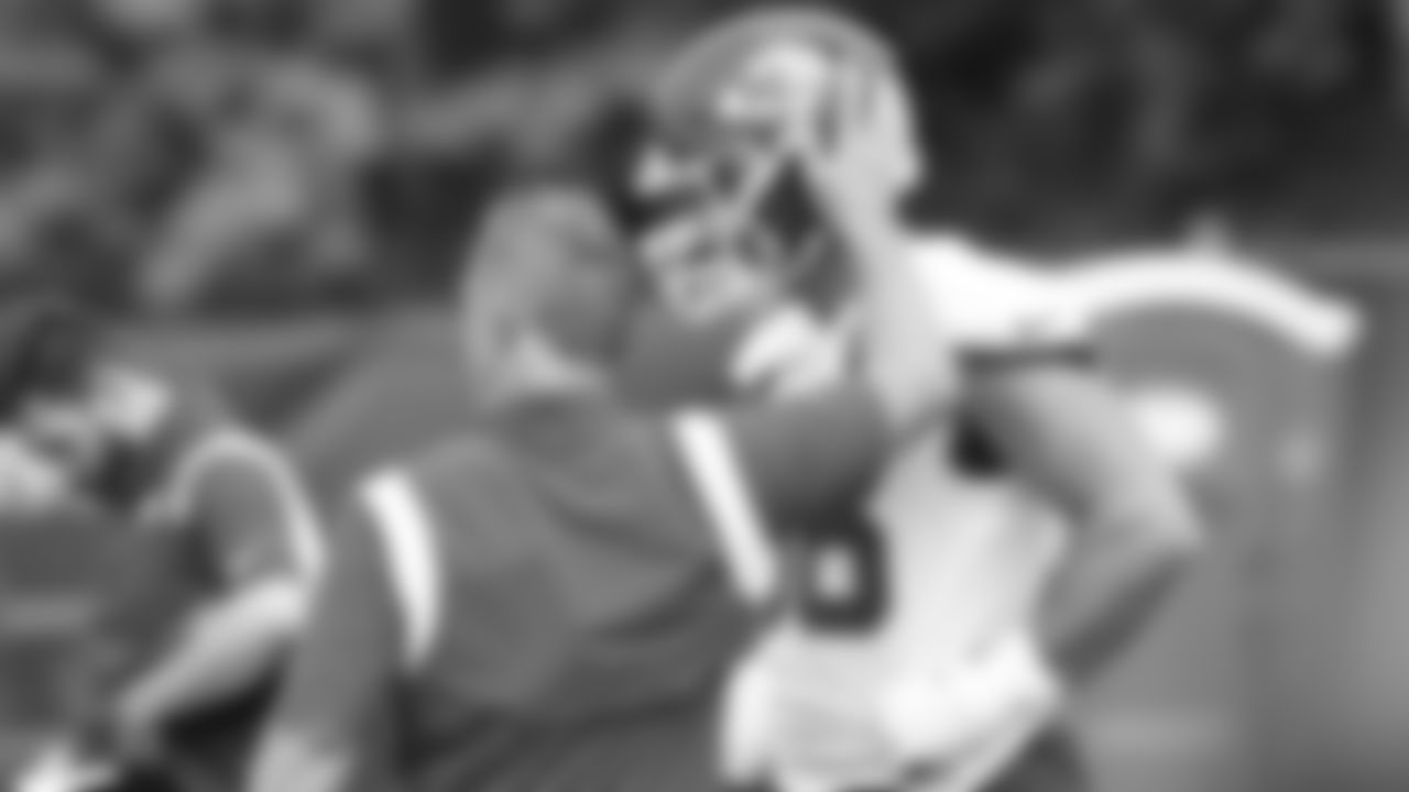 Kansas City Chiefs Defensive Coordinator Steve Spagnuolo and defensive end George Karlaftis (56) during the second day of practice for Kansas City Chiefs rookie mini camp.