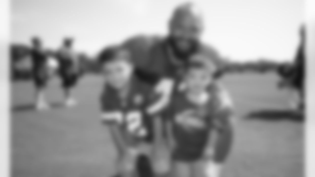 Kansas City Chiefs running back Anthony Sherman (42) with his sons after practice 7/28/18 at Chiefs Training Camp at Missouri Western State University in St Joseph, Missouri