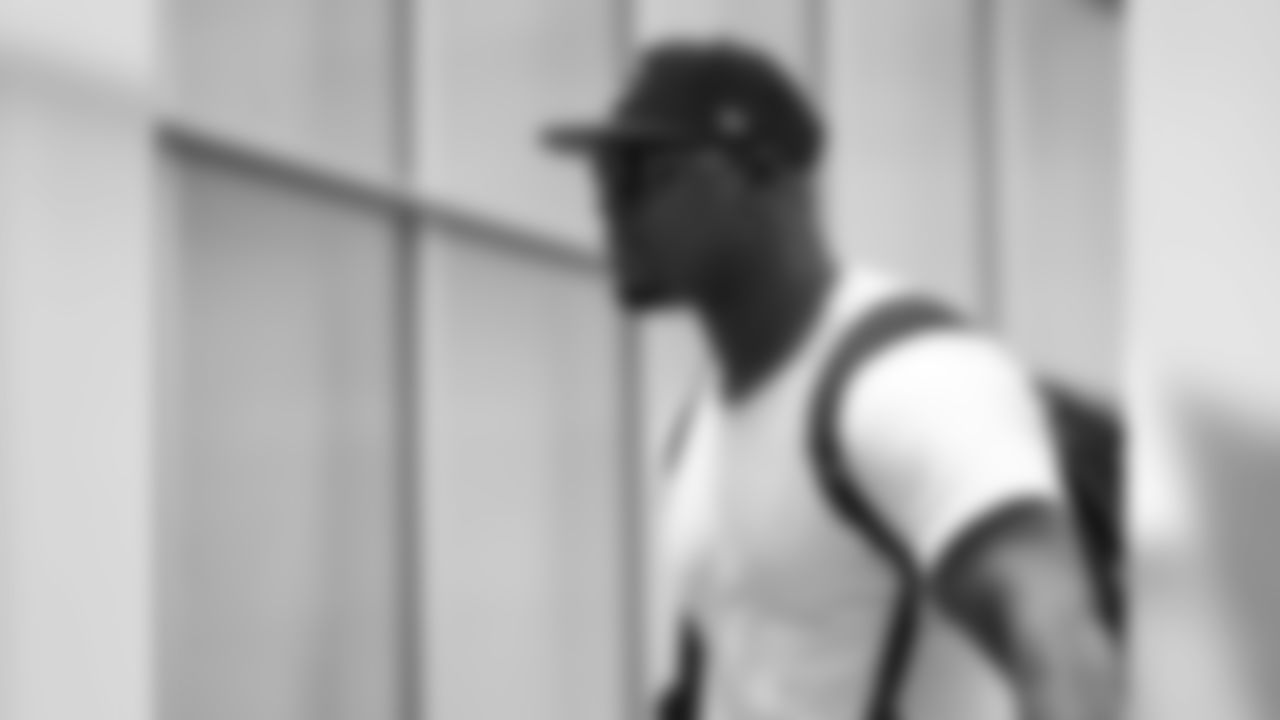 Veteren players arrive at training camp
