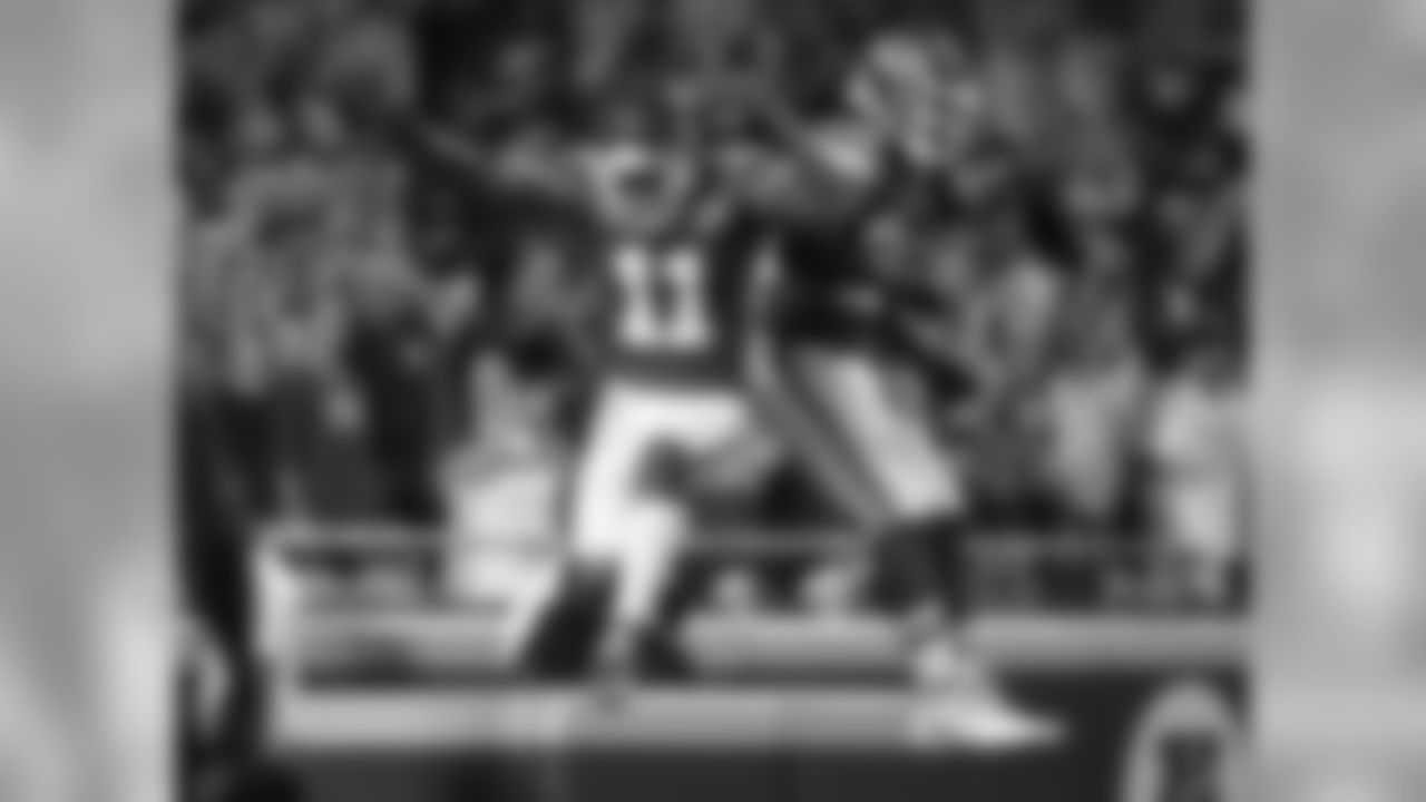 Kansas City Chiefs wide receiver Demarcus Robinson (11) and Kansas City Chiefs running back Damien Williams (26) celebrate during Texans at Chiefs at Arrowhead Stadium on 8/9/18.