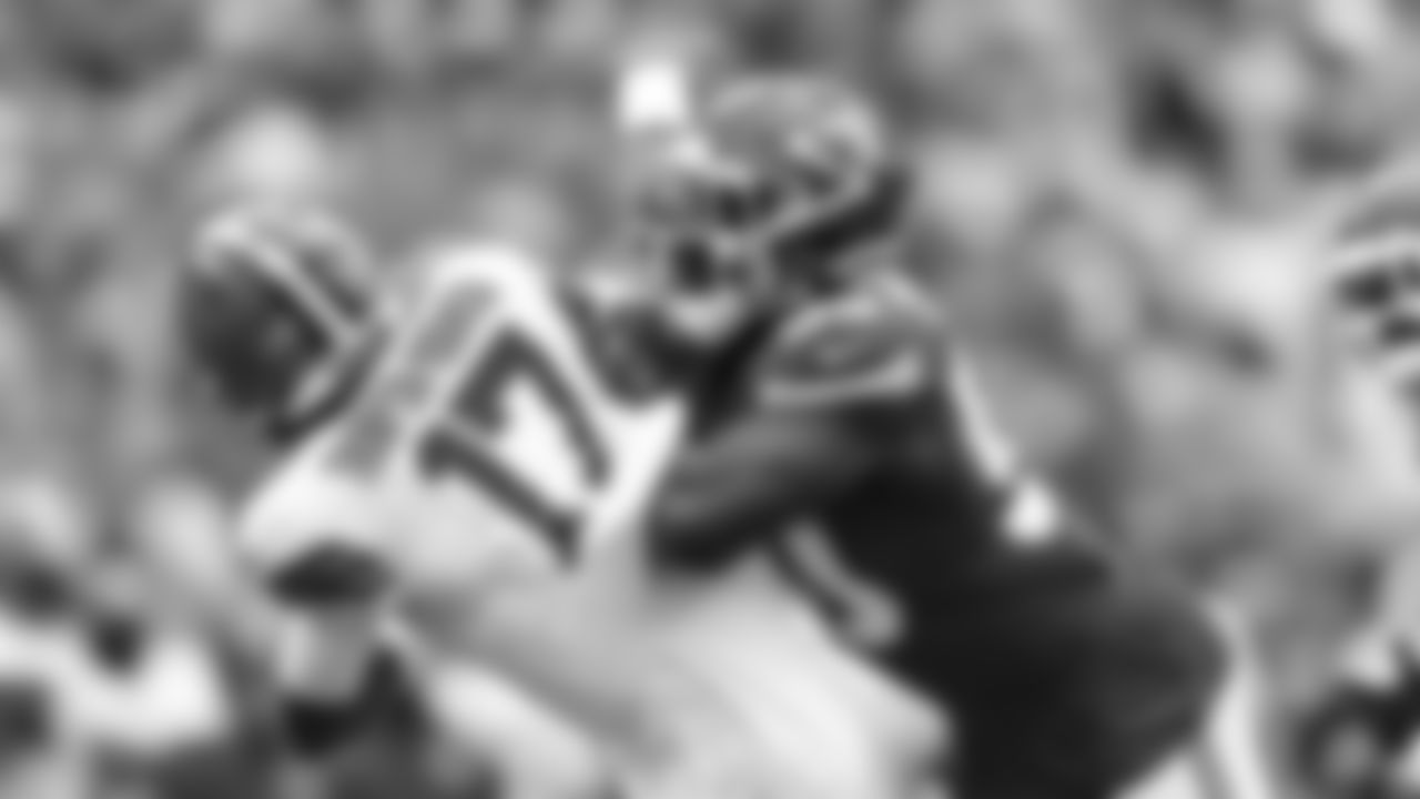 Kansas City Chiefs defensive end Charles Omenihu (90) tackles the quarterback during the Chiefs preseason Week 3 matchup against the Cleveland Browns at GEHA Field at Arrowhead Stadium on Saturday, August 26, 2023.