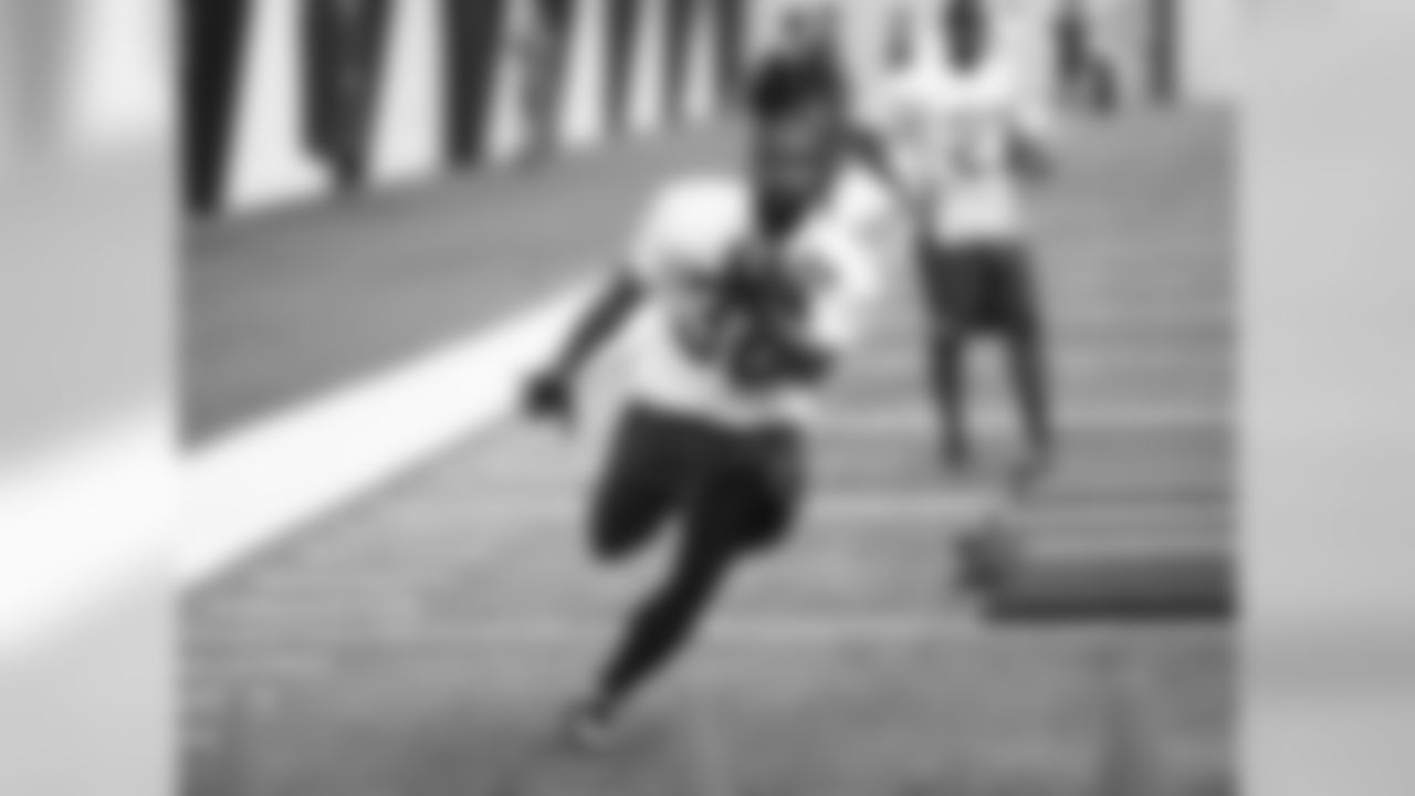 Carlos Anderson from Northern Iowa works on running technique.