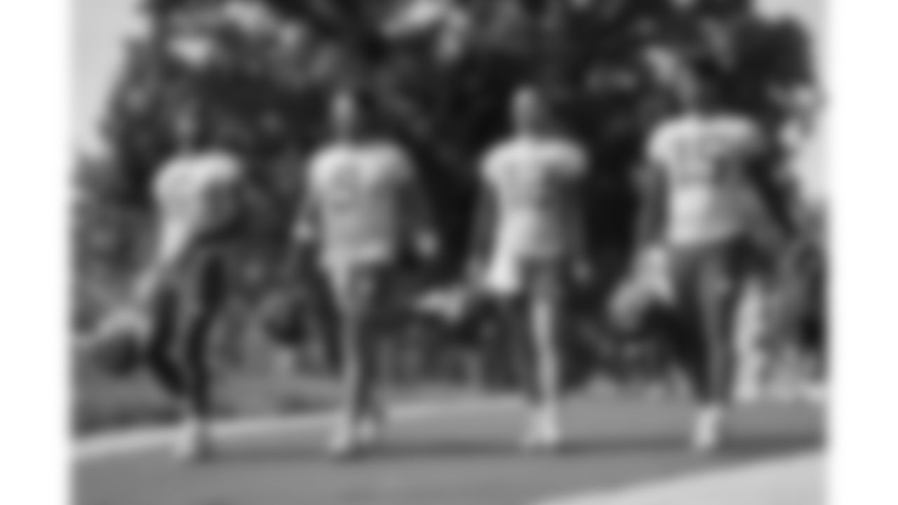 Kansas City Chiefs quarterbacks walk down the hill at day one of Kansas City Chiefs pre Training Camp in St. Joseph, MO on Wednesday, July 19, 2023.