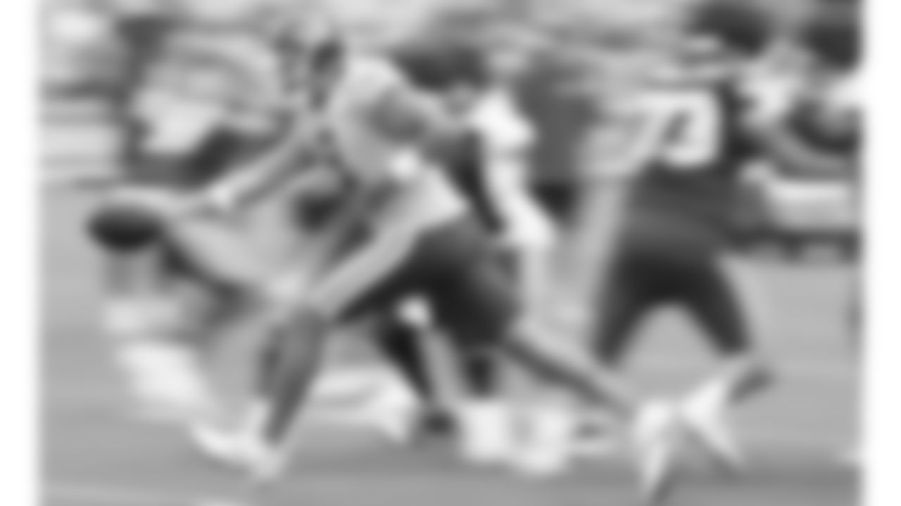 Kansas City Chiefs quarterback Blaine Gabbert (9) hands off the ball at Kansas City Chiefs Training Camp in St. Joseph, MO on Monday, August 7, 2023.