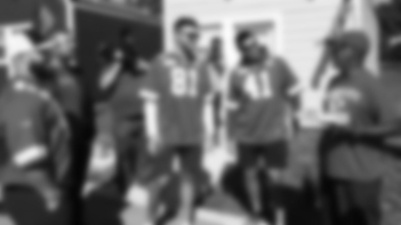 Chiefs players visit the Veterans Community Project to help put finishing touches on homes within the community, followed by a cookout with the residents of VCP. T