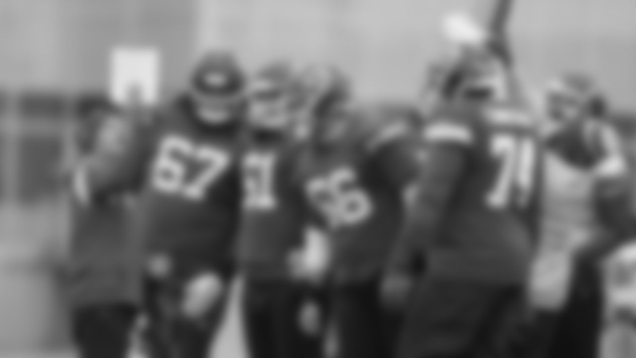 Kansas City Chiefs offensive tackle Lucas Niang (67), center Austin Reiter (61) and Chiefs offensive lineman Michael Caliendo (66) study a play during practice on Thursday, December 8, 2022.