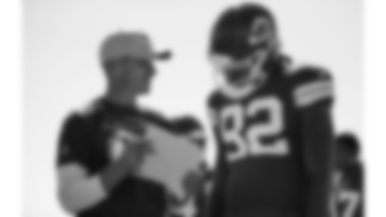 Kansas City Chiefs Wide Receivers Coach Joe Bleymaier and wide receiver Daurice Fountain (82) review a play during practice on Wednesday September 28, 2022.