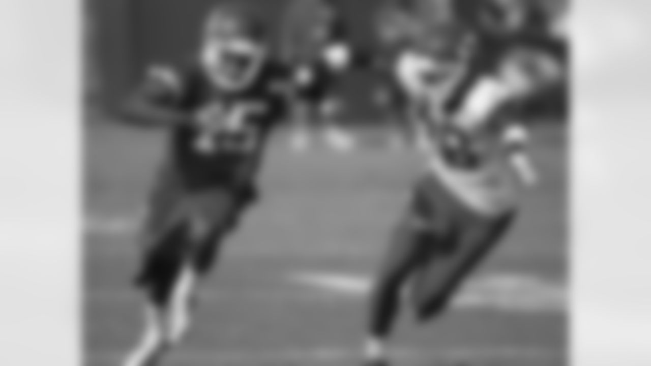 WR A.J. Jenkins and DB Ron Parker