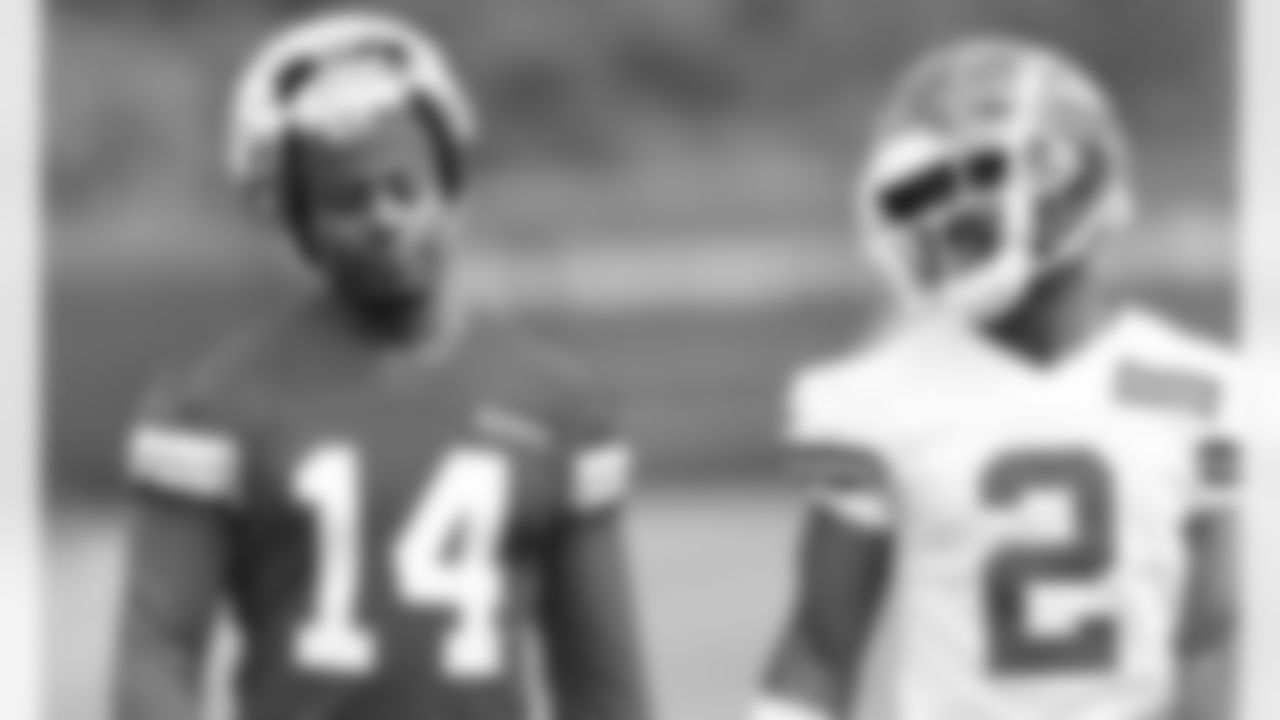WR Cornell Powell (14) and DB DiCaprio Bootle (2) talking during practice at the first day at Chiefs rookie mini camp.