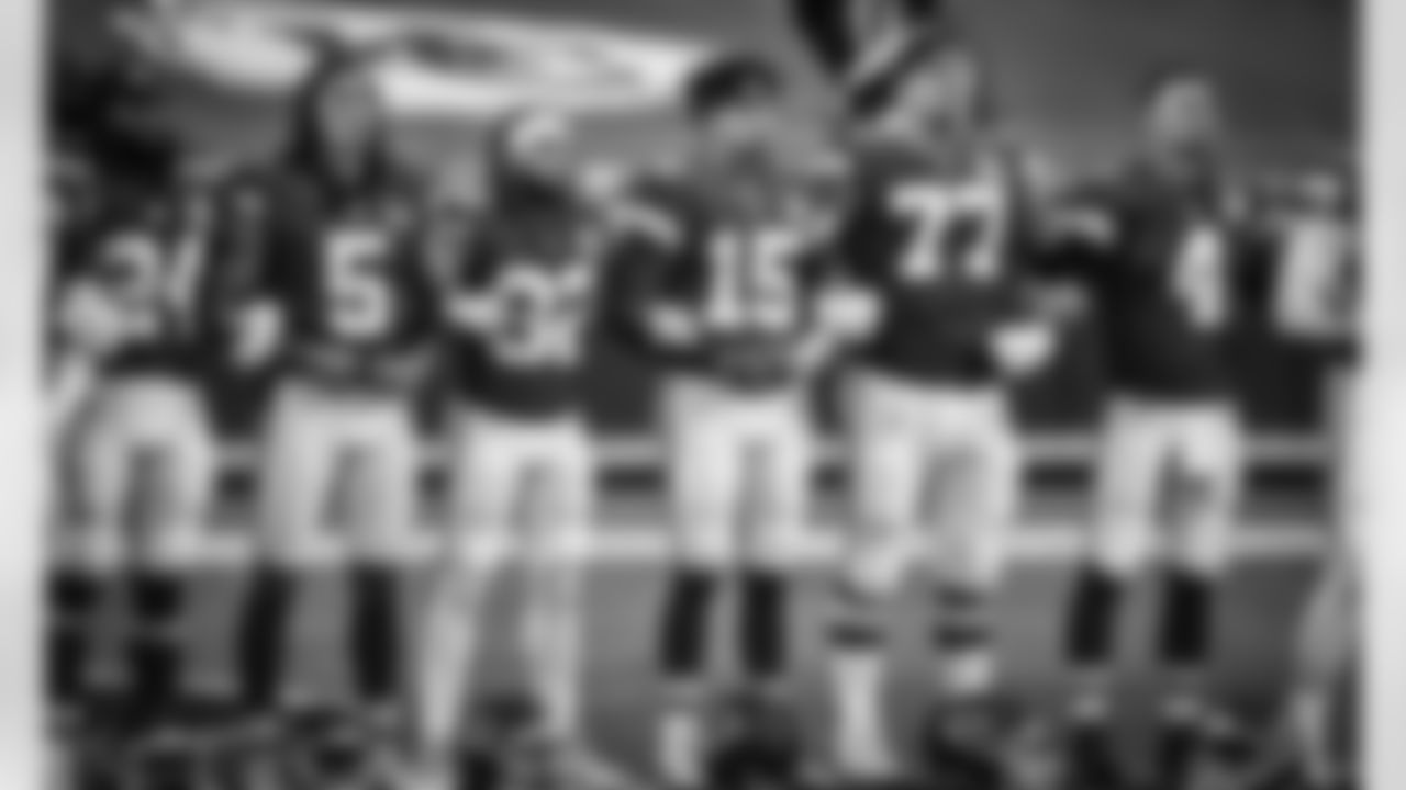 Chiefs players in linked arms during a social justice demonstration prior to the NFL football game between the Kansas City Chiefs and the Houston Texans at Arrowhead Stadium on September 10, 2020.