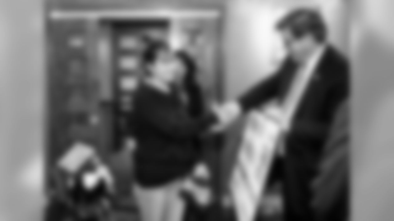 Pat Mahomes and Travis Kelce make a surprise visit to a family in need. While there, representatives from KC Southern and the Guadalupe Centers will inform the family that they will help pay for their home utilities for a year's duration via the Guadalupe Centers' Family Support Services programming. During the visit, Pat and Travis also brought along food and gifts for the family.
