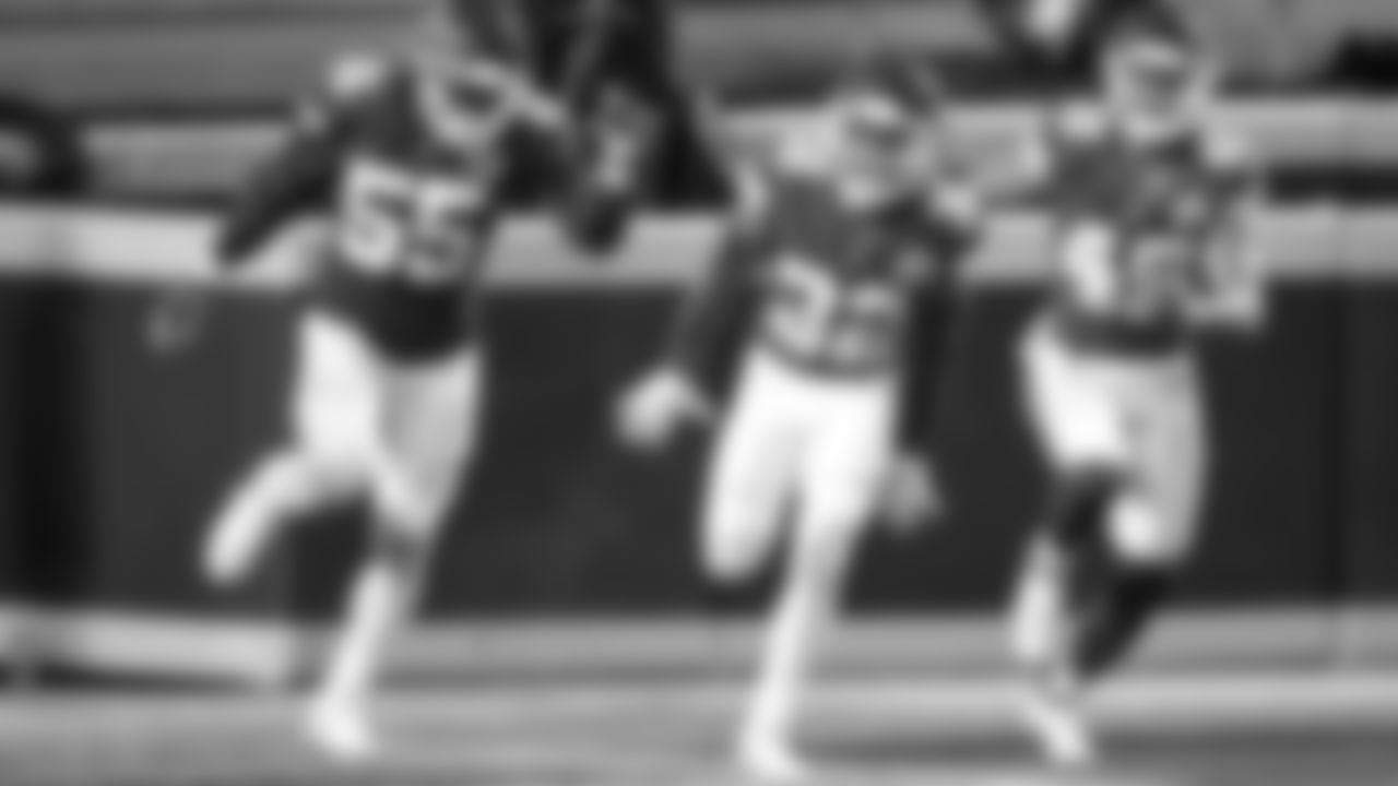 Kansas City Chiefs strong safety Tyrann Mathieu (32), Chiefs defensive end Frank Clark (55), and Chiefs free safety Daniel Sorensen (49) celebrate in the end zone after a pick six during an NFL football game against the New England Patriots, Monday, Oct. 5, 2020 in Kansas City.