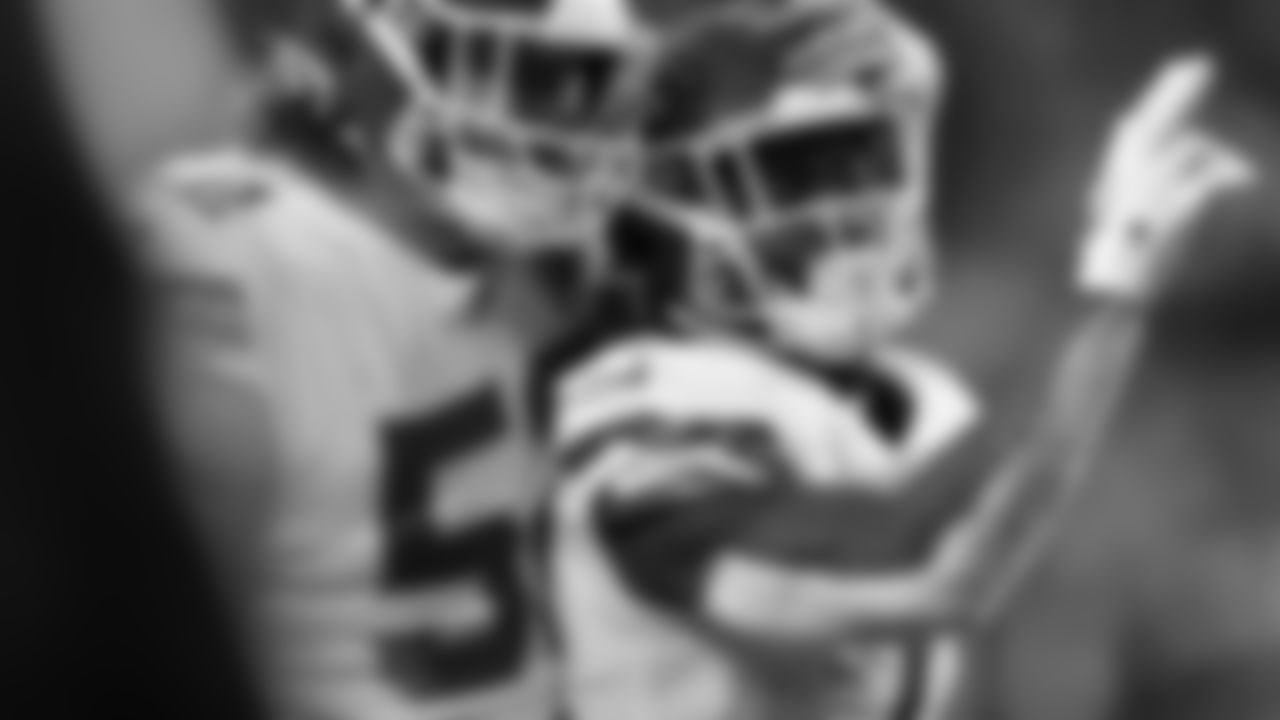 Kansas City Chiefs center Creed Humphrey (52) and running back Jerick McKinnon (1) during an NFL football game against the Denver Broncos, Sunday, December 11, 2022 in Denver.