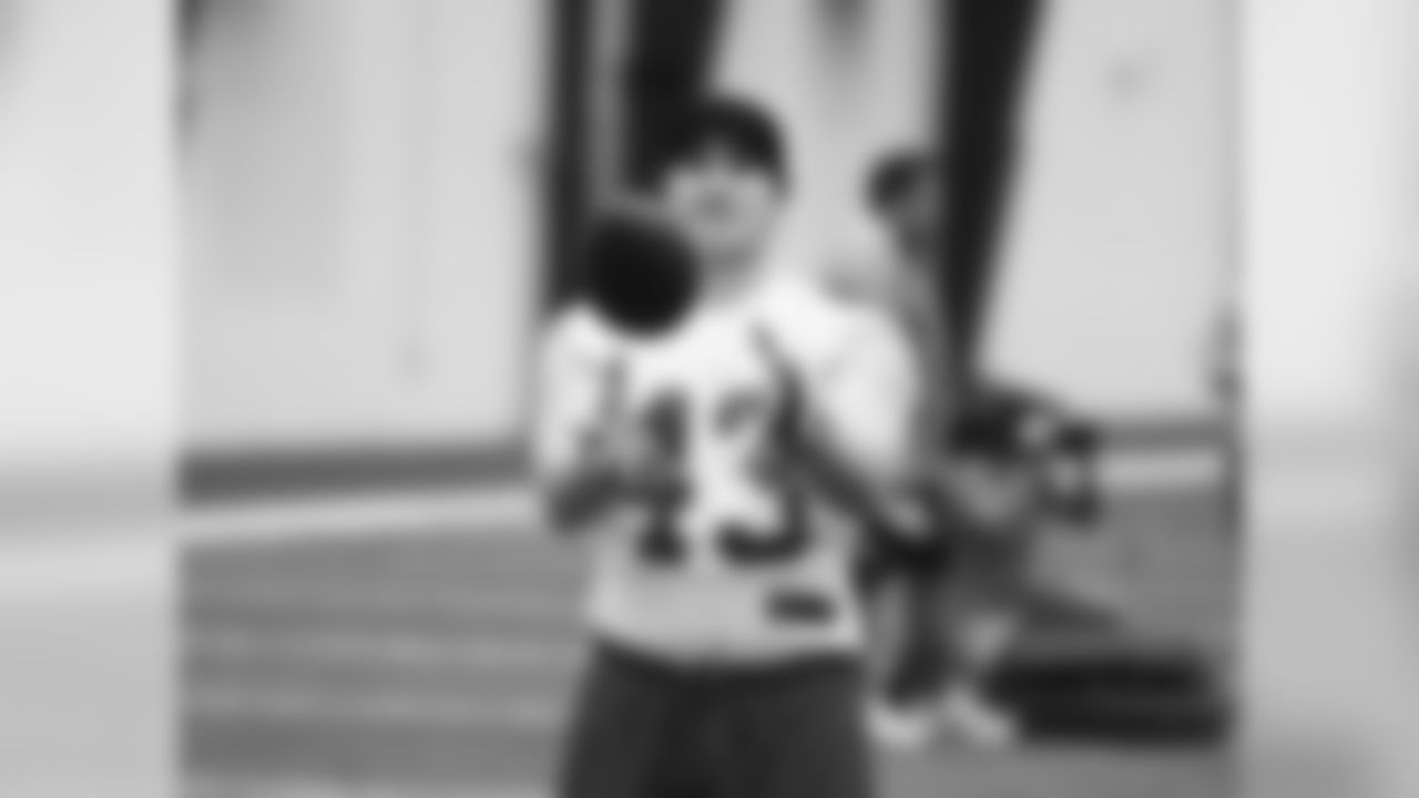 TE Kellen Bartlett catches passes during warm ups.