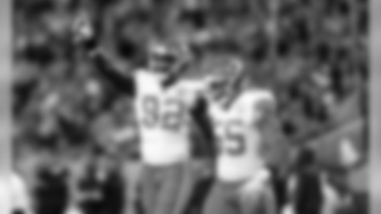 Kansas City Chiefs Linebacker Tanoh Kpassagnon (92) and Kansas City Chiefs Defensive End Frank Clark (55) during the game between the game between the Kansas City Chiefs and the Denver Broncos on October 17, 2019 at Empower Field at Mile High.