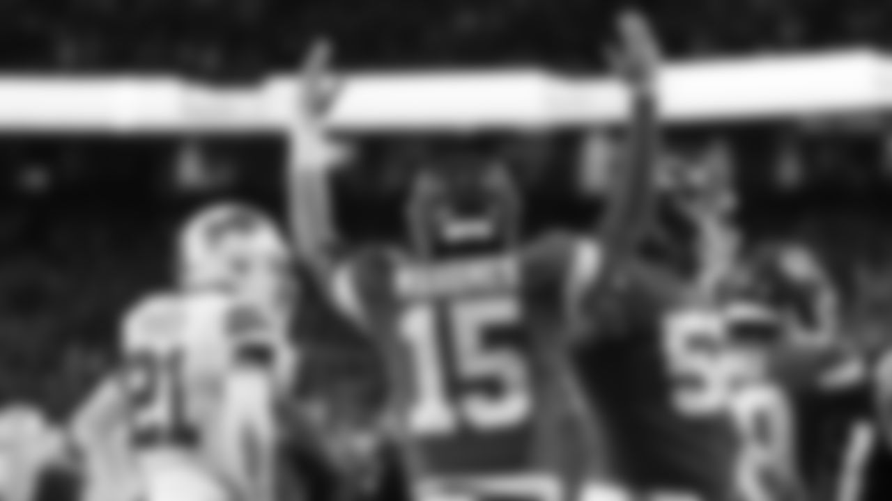 Kansas City Chiefs quarterback Patrick Mahomes (15) signals a touchdown during the divisional playoff football game against the Buffalo Bills, Sunday, January 23, 2022 in Kansas City.