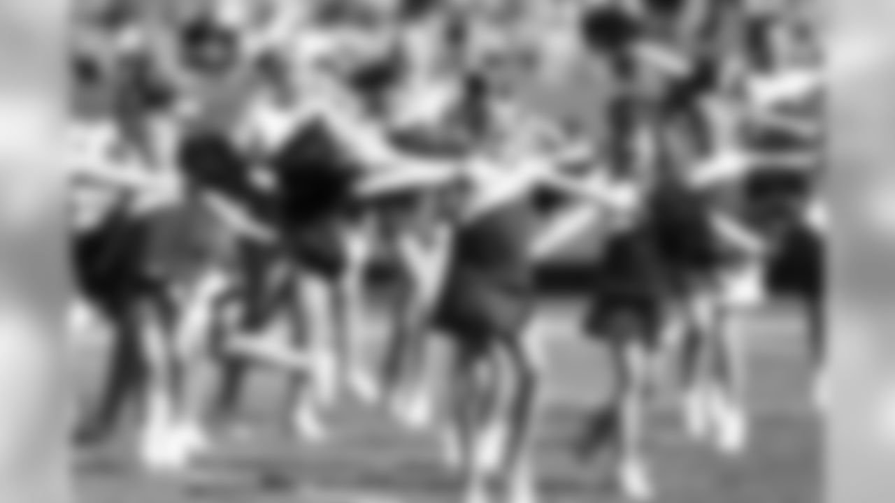 Kansas City Chiefs Cheerleaders and Junior Chiefs Cheerleaders Perform at Halftime during the Chiefs vs Rams game